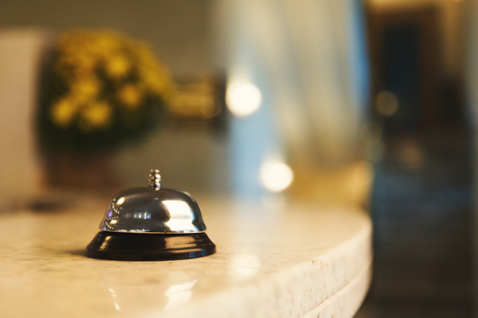 Hotel accommodation call bell on reception desk